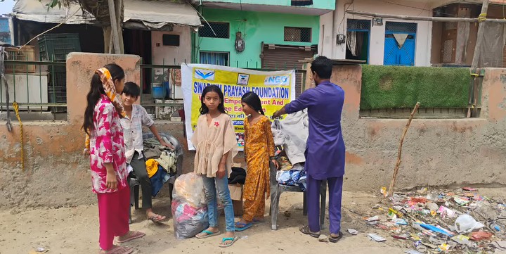Community members receiving donated clothing