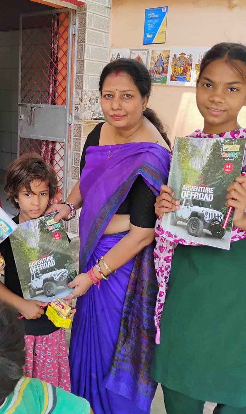 Children receiving educational materials